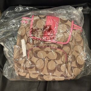 Coach Signature Canvas Backpack in Brown with Pink Trim